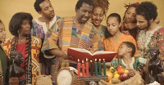 Family celebrating Kwanzaa together at home during the holiday